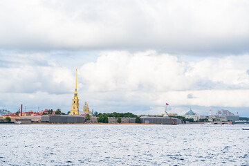 Peter and Paul Fortress across Neva River. Cloudy summer day, Saint Petersburg