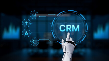 Obraz na płótnie Canvas A robotic hand interacts with a vibrant holographic CRM system, showcasing the intersection of technology and business solutions in a modern office environment. Synapse