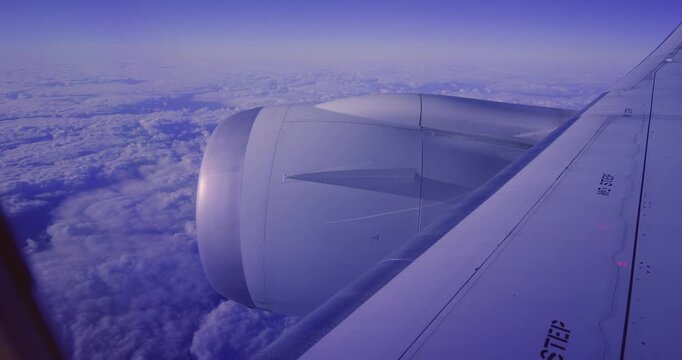 Airplane Engine View Above Clouds