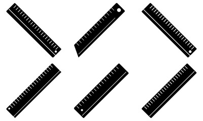 Black metal office supplies arranged in a circular pattern on a white background, viewed from directly above