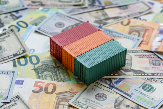 Cargo containers on the euro and dollar background as a concept for goods export. Cargo containers