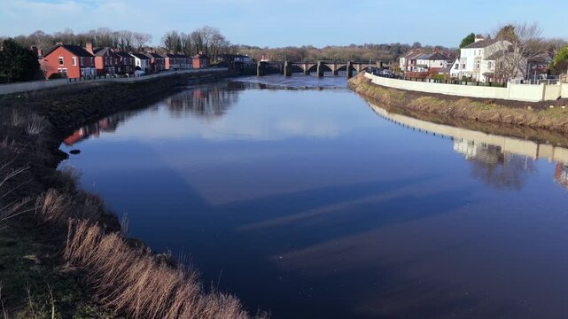 Aerial video of River Ribble flood defenses and Broadgate in Preston, Lancashire. 