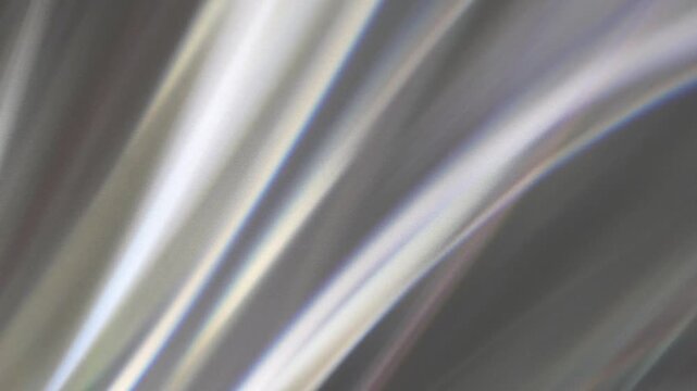 Abstract Soft Holographic Light Refractions: Real 4K Camera Footage of Rainbow Pastel Wave Patterns