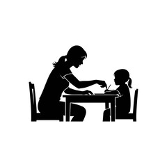 Fototapeta premium Silhouette of a mother helping a child with homework at a table