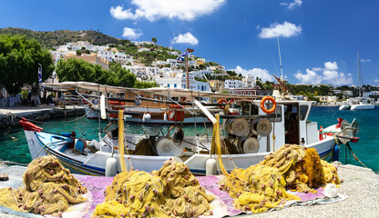 Close up of Traditional Yellow Fishing Nets on Rustic Wooden Boat in Leros Island Harbour Authentic Mediterranean Aesthetic Dodecanese Greek Islands Travel