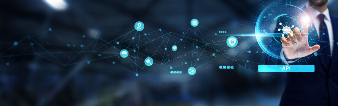 API, Businessman hand touching the global networking and API integration solutions that connect software systems, streamline cloud services, and enable seamless developer collaboration