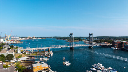 Fototapeta premium Aerial View of the Memorial Bridge connecting Maine and New Hampshire over the Piscataqua River shot from Badgers Island in Kittery Maine