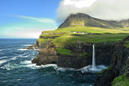 Beautiful waterfall, Sunny Day, Vagar, Faroe Islands, Denmark.