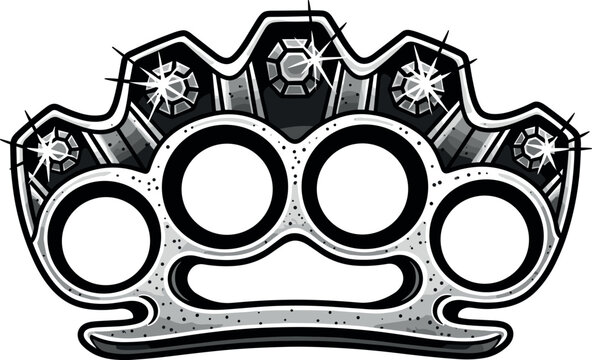 A silver metal knuckle duster with spikes and rivets