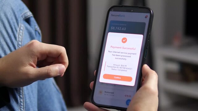 Close-up of hands navigating a seamless digital payment portal. Visualizes the full journey from bill review to payment success. Ideal for telecommunications ads, software demos, and modern digital