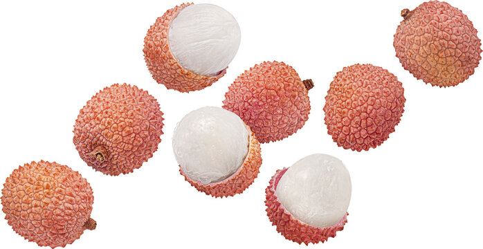 Falling lychee fruits isolated on white background