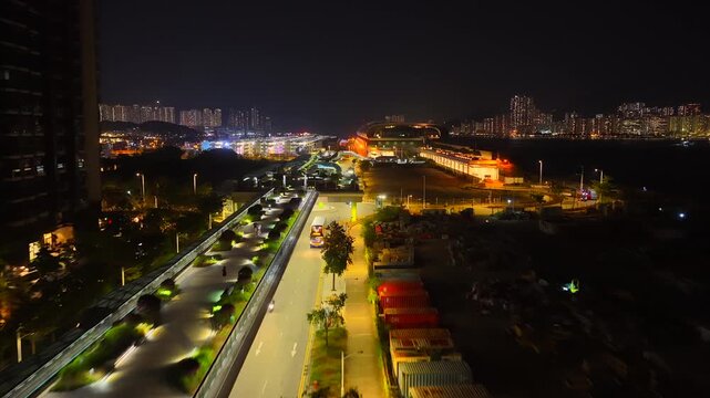 Drone Aerial Skyview of a Mega Luxury Cruise Ship is docking at the Kai Tak cruise terminal near Kai Tak Sports Park Kwun Tong Kowloon Victoria Harbour Hong Kong