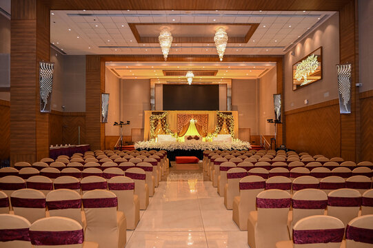 PIMPRI, INDIA - FEBRUARY 11, 2026: Interior view of a decorated banquet hall during a wedding setup 