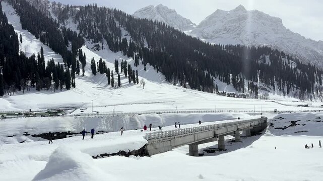 Scenic video of the mountain road and pathway leading to Sonmarg, passing through lush valleys, flowing rivers, and majestic Himalayan landscapes in Jammu and Kashmir.