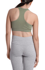 Woman in sportswear with bad posture on white background, back view