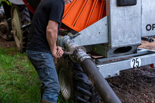 Farmer watering the land
