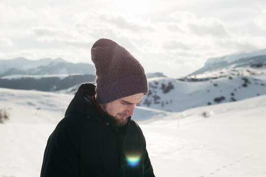 man standing in the snow