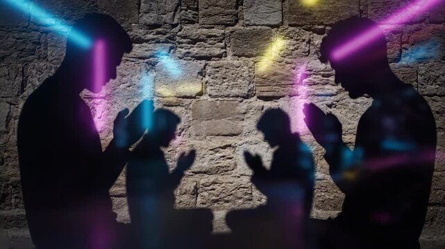 Silhouette of a man and two children praying together in sequence, with colorful light rays on a stone wall. Spiritual devotion concept.