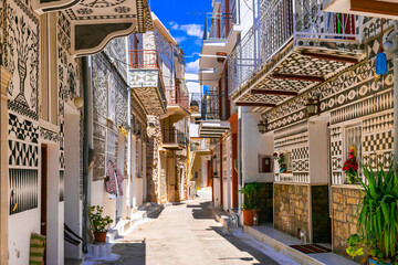 Mastic Villages Greece .View of Pyrgi Village with Traditional Geometric Xysta Wall Paintings and Sunny Empty Street Chios Island Authentic Mediterranean Aesthetic