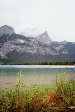 Lake surrounded by mountains in Banff in summer  