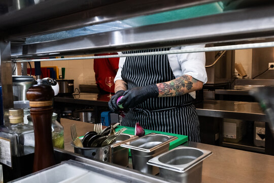 Cook preparing ingredients 