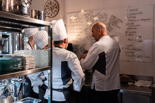 Chef instructing his assistants 