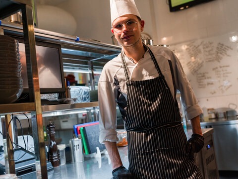 Chef posing at kitchen
