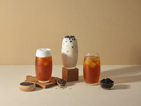 Three diverse bubble tea flavors showcased in elegant glasses