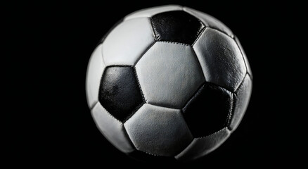 Fototapeta premium Black and white soccer ball on plain background, minimalist photorealistic style