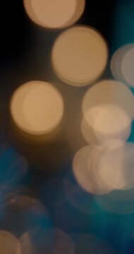Abstract background with lens bokeh effect for title or logo display. Colourful light leaks on blurred background with copy space. Template for vertical design.