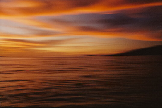 Blurry abstract photo of the beach at sunset