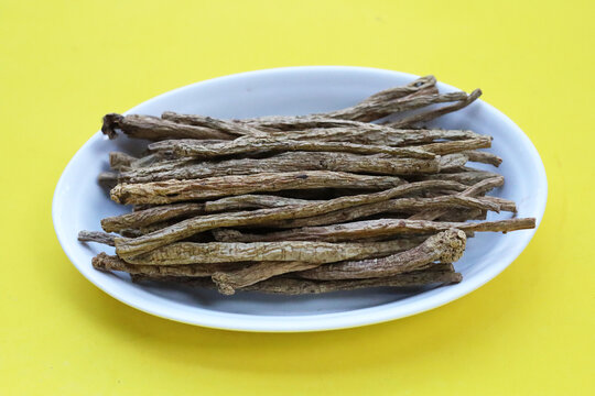 Dried brown Codonopsis root sticks used in Chinese herbal medicine.
