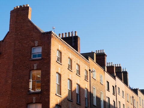 Building With Red Bricks and Big Windows in Dublin on a Sunny Day