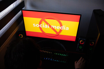 Digital Regulation Research Scene on Spanish Social Platforms, Computer Screen with Prohibition Symbol Over Social Media Text