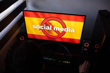 Global Concept for Social Media Ban in Spain on Desktop Monitor