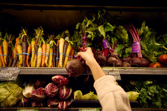 Anonymous person choose fresh beets