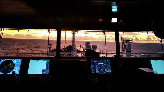 INSIDE OF BRIDGE ON LNG VESSEL DURING SUNSET SLIGHTLY ROLLING