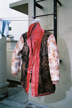 Kitsch chinese jacket hanged out to dry