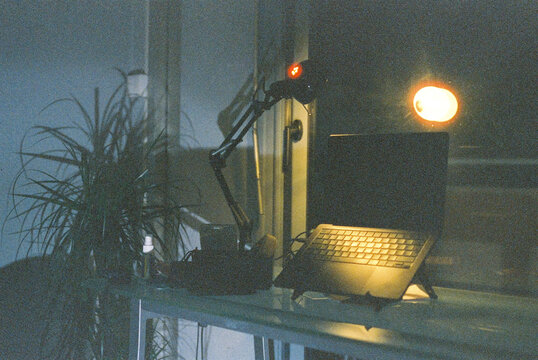 Workspace Setup With a Lamp and notebook 