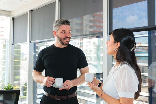 Casual Colleagues Coffee Conversation in Bright Office