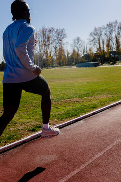 Back view shows a runner performing targeted leg strength movements
