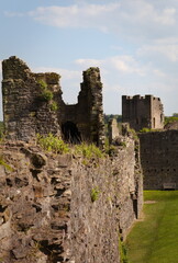 Fototapeta premium Ancient stone castle ruins with grassy surroundings - Richmond Castle - England