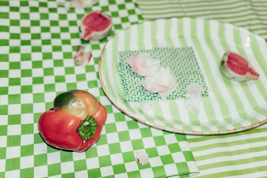 Setting food on checked tablecloth 