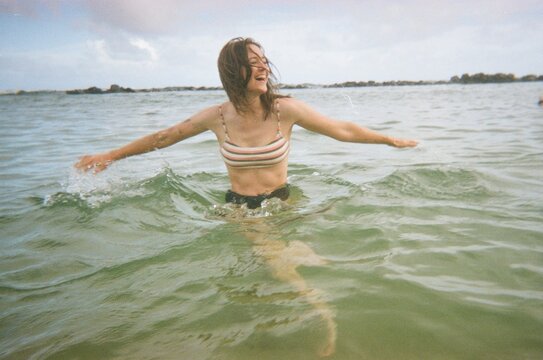 playful swimming in ocean