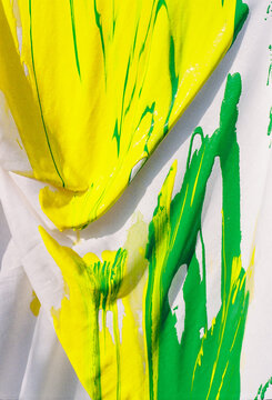Bright Colors Mix in a Paint Art Creation at Outdoor Event