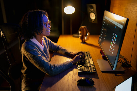 Person working at desk with computer
