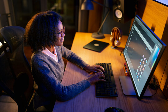 Working late at night on a computer desk
