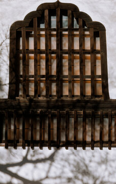 Zen Geometry: Light and Shadow and Grilles on the White Wall.
