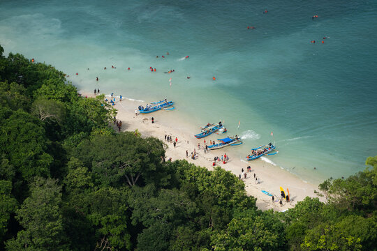 Busy Beach With Fishing Boats