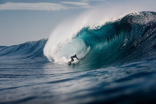 Surfer expertly navigating powerful surf off Lanzarote&rsquo;s coast